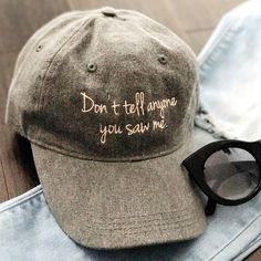 Comfortable and Stylish is what we look for in a hat to wear for those casual days out. Our Trendy dad hat for women is super cute. Hat is designed to be both durable and comfortable to wear all day long.  Perfect Dad Hat for moms on the go running errands.  ------- How to order --------- Choose had in the drop down menu and add to cart.  ------- Design Option --------- "Don't Tell Anyone You Saw Me." Baseball Hat. Cute for everyday. Comfortable and roomy with adjustable straps  Peach thread emb Trendy Embroidered Cap, Curved Brim Hat With Letter Embroidery, Casual Embroidered Trucker Hat With Short Brim, Casual Trucker Hat With Embroidered Short Brim, Trendy Baseball Cap With Letter Embroidery, Trendy Letter Embroidered Baseball Cap, Trendy Letter Embroidery Baseball Cap, One Size Fits Most Cap With Embroidered Text, Embroidered Text Cap One Size Fits Most