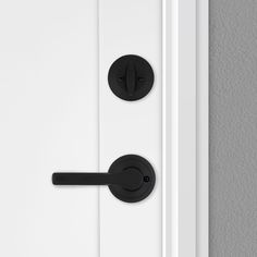 an open door with two black handles on it