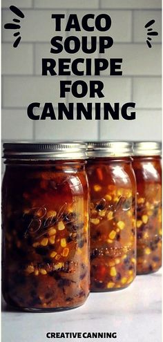 three jars filled with food sitting on top of a counter next to a sign that says taco soup recipe for canning