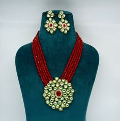 "This is a stunning handmade necklace perfect for high end Jewelry Collector, a keeper in Traditional Vintage Indian/Pakistani Bridal jewelry and a Luxury Gift for your Daughter, Sister or Wife on Wedding or Anniversary. Perfect for any type of occasions, weddings And celebrations and a beautiful & memorable gift for weddings and special occasions. -Beaded Necklace Set with Earrings. -Designer multi layered faceted red onyx beaded necklace. -Gold Plated Set with Kundan Stones which shine lik Onyx Beads Jewellery, Red Jewelry Sets With Round Beads For Festivals, Red Beaded Temple Jewelry Sets, Red Round Beads Temple Jewelry, Red Beaded Jewelry Sets For Celebration, Red Bridal Necklace With Round Beads For Festivals, Red Kundan Necklace With Round Beads For Party, Red Round Beads Jewelry For Festive Occasions, Red Round Beads Bridal Necklace For Party