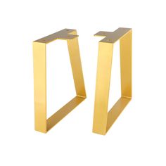 pair of gold metal bookends on white background