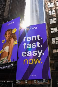 an advertisement on the side of a tall building in new york city, with skyscrapers behind it