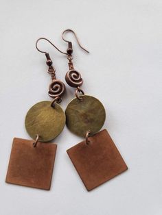 Check out this item in my Etsy shop https://www.etsy.com/listing/1137701218/copper-spin-earrings-copper-swirl-and Arrow Earrings, Turquoise Accents, Triangle Pendant, Classic Earrings, Square Pendant, Antique Earrings, Brass Jewelry, Copper Earrings, Circle Pendant