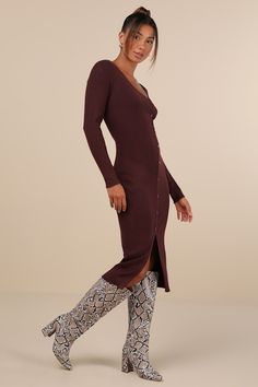 Prepare for a season of looking flawless in the Lulus Demure Attitude Chocolate Ribbed Asymmetrical Midi Sweater Dress! Soft and stretchy ribbed knit shapes this sweater dress that has a comfy, long sleeve bodice with a stylish asymmetrical V-neckline. The figure-skimming silhouette features an asymmetrical, decorative button placket that continues down to a flirty front slit at the midi hem. Pair to perfection with anything from ballet flats to boots! Fit: This garment fits true to size. Length Long Sweater Dress With Boots, Sweater Dress And Boots, Dresses With Boots Fall, Sweater Dress With Boots, Boots Fit, Midi Sweater Dress, Long Sweater Dress, Midi Dress Casual, Sweater Dress Midi