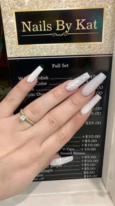 Long Snowflake Nails, Frosty White Acrylic Nails, White Nails Ideas Winter, Long White Christmas Nails, Winter Acrylics Nails, White Nails With Snowflake Design, White Base Christmas Nails, White Winter Nails Snowflakes, White Christmas Nails Acrylic Long