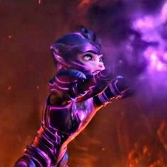 a woman dressed in purple and black holding her hands out to the side with fire behind her