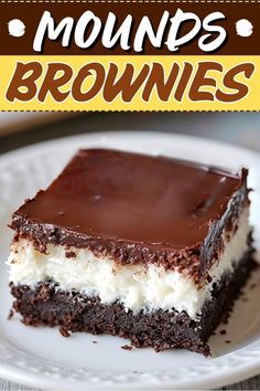 a close up of a piece of cake on a plate with the words moulds brownies