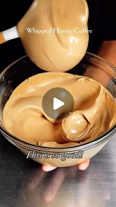 a person is pouring liquid into a bowl with the words whipped honey coffee on it