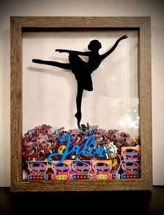 This personalized dance shadow box is perfect for any dancerIt is beautiful on its ownbut can also be used to store and show off dance competition pinsThe example shown in the second last picturehas 41 pins in itbut you have more than enough room left for moreThe shadow box opens up like a picture frame in the back so you are able to put the pins (or anything reallyinsideThere is also a sawtooth hanging device on the back so you can hang it on the wallCheck out our other dance items in our shop Dance Competition Award Display, Dance Cover Up, Dance Ribbon Display Ideas, Dance Awards Display Ideas, Recital Gifts For Dancers, Pin Holder Display, Dancing Shadow, Dance Shadow, Cheer Room