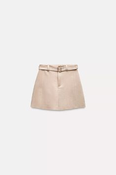 FAUX SUEDE MINI SKIRT - Sand | ZARA United States Fax Suede Skirt, Luxury Miu Miu Skirt For Work, Elegant Beige Mini Skirt, Short Cream Leather Skirt, Cream Suede Skirt, Pleated Beige Mini Skirt, Cream Leather Skirts, Luxury Miu Miu Skirt For Workwear, Leather Cream Skirt