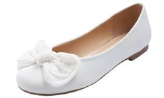 a white shoe with a bow on the side