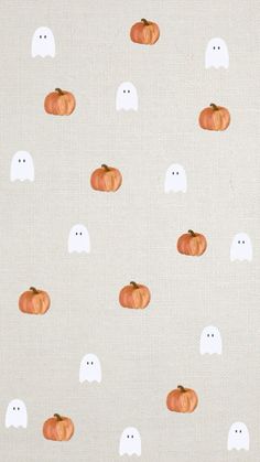 a white background with orange pumpkins and ghost faces