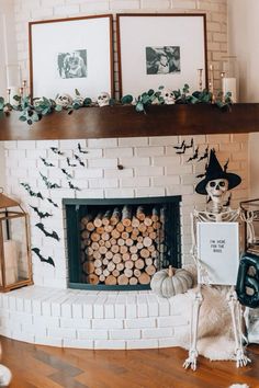 the fireplace is decorated with halloween decorations