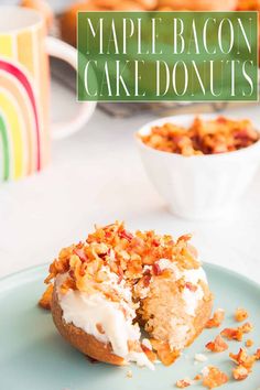 a close up of a doughnut on a plate with the words maple bacon cake donuts