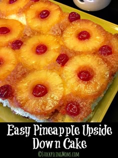 pineapple upside down cake on a yellow plate with the words easy pineapple upside down cake