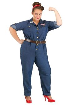 a woman in a blue jumpsuit and red heels posing with her arms behind her head