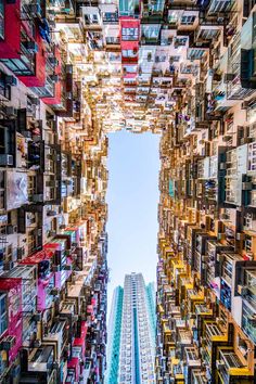 an aerial view looking up at tall buildings