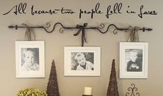 an old dresser with christmas decorations and pictures on the wall above it, along with other items