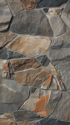 a stone wall with orange and grey colors