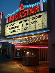 a theater marquee with the words bookstar written on it's side