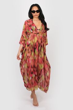 A great kaftan for on holiday over swimwear but looks just as good worn over leggings/shorts and a vest top for garden parties and days in the park. It has a v neck with a cut out on the front and a band that threads through and ties around the body the inside for a flattering shape. Made from a floaty chiffon fabric that falls beautifully around the body. FABRIC: * Man made * Deadstock fabric * Low crease * Light weight SIZING: * One size will fit between 8-16 UK * Model is 5ft 9in and wears th Multicolor V-neck Beach Dress For Day Out, Multicolor V-neck Beach Dress, Vibrant Print V-neck Kaftan For Beachwear, Holiday V-neck Floral Print Beach Dress, Casual V-neck Festival Cover-up, V-neck Beachwear Cover-up For Day Out, Flowy V-neck Kaftan For Day Out, Bohemian V-neck Kaftan For Spring, V-neck Floral Print Festival Cover-up