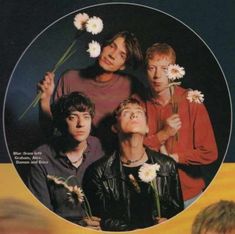 an album cover with three men standing in front of flowers and one man looking up at the sky