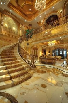 a large staircase in the middle of a living room with chandelier above it