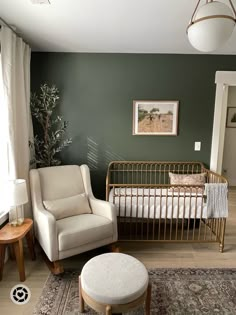 a baby's room with a crib, rocking chair and footstool