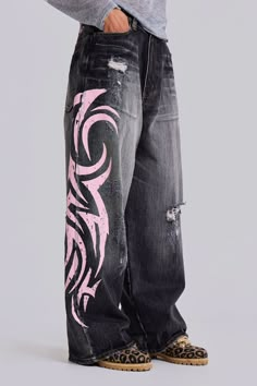 Pink Blade XL Colossus Jeans Original XL Colossus fit 5 pocket styling Heavy slub denim fabric Washed black colourway with sandblast Pink Tattoo screenprint down sides and back Distressed finish Model is 5 ft 9, size 8 and wears a size W30 for an oversized fit. Style code: JMJE490295% Cotton, 5% ViscoseMachine wash at 30 degreesCool iron on reverseLay flat to dryWash inside outRecommend washing on cold with similar colours Colossus Jeans, Custom Jeans Diy, London Clothing, Grey Pinstripe Suit, Pink Tattoo, Painted Clothes Diy, Making Clothes, Diy Clothes Design, Custom Jeans