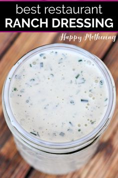 a mason jar filled with ranch dressing sitting on top of a wooden table and text overlay reads best restaurant ranch dressing