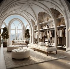 a living room filled with lots of white furniture and large arched windows above the couches