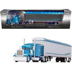 a blue and white semi truck is shown in the box next to it's packaging