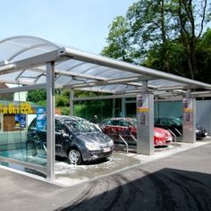 a car wash station with cars parked in it