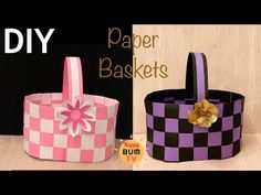 two baskets made out of paper with bows on them