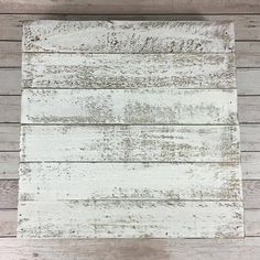 an old white painted wood plank wall