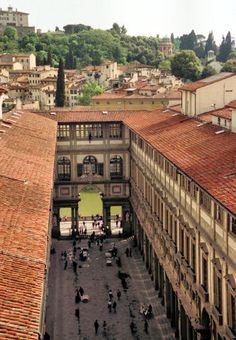 an aerial view of some buildings and people