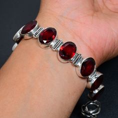 Red Garnet Bracelet Red Garnet Gemstone Handmade 925 Sterling Silver Bracelet Red Garnet Bracelet For Gift Red Garnet Bracelet For Her * PRODUCT INFORMATION ● Gemstone : Red Garnet ● Bracelet Length ( Inches . ) : 8 ● Main Stone Creation : Natural ● Metal : 925 Sterling Silver ● Purity : 925 Parts Per 1000 ● 925 Stamped : Yes ● Silver Polish : High * Benefits Of Wearing Silver As a metal, silver has significant health benefits that have been used across cultures for centuries. Silver has a prove Red Gemstone Bracelets As Gift, Red Gemstone Bracelets For Gift, Handmade Red Ruby Bracelets, Red Faceted Oval Jewelry, Red Oval Faceted Jewelry, Faceted Oval Red Jewelry, Red Faceted Round Bracelets, Red Ruby Bracelets, Red Oval Gemstone Bracelet