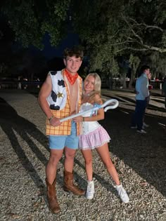 a man and woman dressed up in costumes