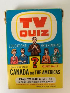 an old tv quiz box sitting on top of a table