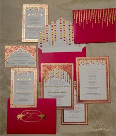 the wedding stationery is red and gold