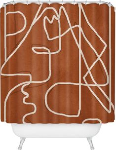 a brown shower curtain with white lines and shapes on the outside, in front of an orange background