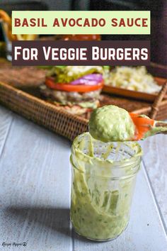 an avocado sauce for veggie burgers in a jar