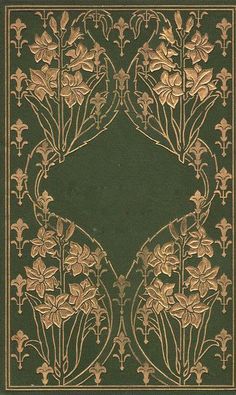 a green and gold book cover with flowers on it