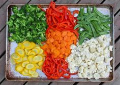 vegetables are laid out on a tray ready to be cut into bite - sized pieces