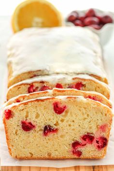 sliced loaf of lemon raspberry bread with icing