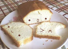 two slices of bread on a plate with the word mom spelled in small letters across them