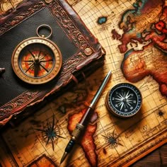 an old map, compass and pen on top of it with the world in the background