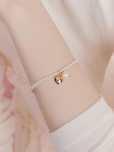 Composition : brass + freshwater pearl + artificial pearl + zincColor : silver,goldCountry of Origin : KOREA Heart Pearl Bracelet, Cotton Dress Indian, Rakhi Design, Pearl Heart, Dress Indian, Heart Bracelet, Women Accessories Jewelry, Pearl Bracelet, Cotton Dress