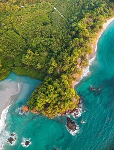 an aerial view of the ocean and beach in costa rica, costa rica national park