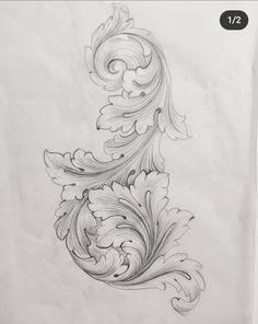 a drawing of an ornate design on white paper